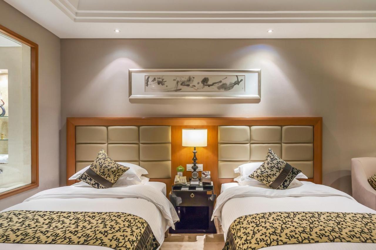 Wyndham Xinyang Downtown Hotel Екстериор снимка